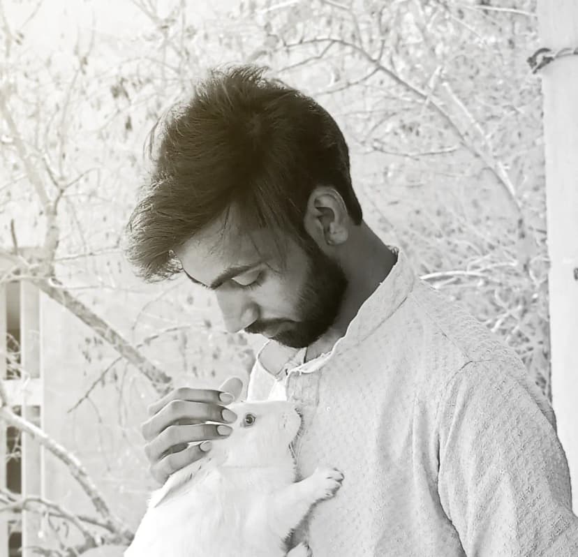 Md Usman Ansari with a cute rabbit